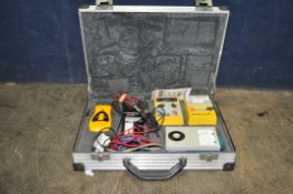 AN ALUMINIUM CASE CONTAINING ELECTRICAL TESTING TOOLS including meters by Robin, Kyoritsu,