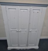 A MODERN WHITE PAINTED PINE TRIPLE DOOR WARDROBE, width 150cm x depth 62cm x height 193cm, condition