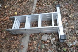 A SET OF ALUMINIUM FOLDING MULTI-PURPOSE LADDERS, with four rungs to each section, height while