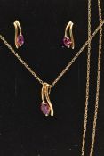 A YELLOW METAL PENDANT NECKLACE AND EARRINGS, the pendant set with a marquise cut garnet, stamped