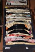 TWO BOXES OF VINYL SINGLE 45RPM RECORDS containing over 200 hundred singles, various artists and