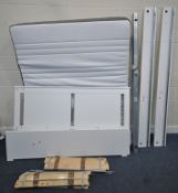 AN IKEA 5FT BEDSTEAD, with siderails, slats, and bolts, along with a mattress and topper,