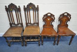 A PAIR OF EARLY 20TH CENTURY MAHOGANY HALL CHAIRS, with scrolled and foliate details serpentine