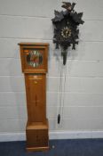 A MODERN BATTERY POWERED OAK CLOCK, with a 6.5 brass dial, depicting Arabic numerals height 149cm,