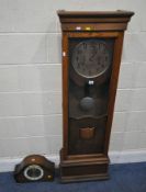 INTERNATIONAL TIME RECORDING Co Ltd, LONDON, A CLOCKING IN MACHINE DIAL, in an adapted oak case, the