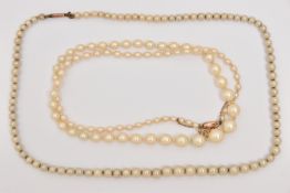 TWO IMITATION PEARL NECKLACES, both fitted with rose metal barrel clasps and stamped 9ct (