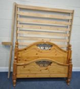 A MODERN PINE 4FT6 BEDSTEAD, with side rails, slats, bolts and central support bar, condition