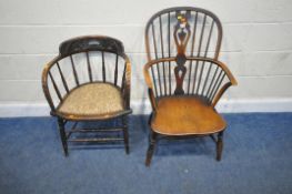 A 19TH CENTURY ELM WINDSOR ARMCHAIR, with a central splat back, swept armrests, raised on turned