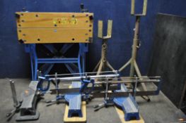 A PAIR OF TALL ADJUSTABLE HEAVY DUTY AXLE STANDS, along with three mitre saws, one missing its