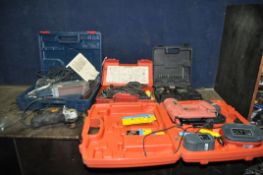 A COLLECTION OF POWER TOOLS including a Bosch GBS75E belt sander, a Bosch 110v drill (untested), a