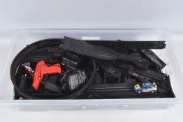 AN UNBOXED ARTIN SLOT CAR RACING SET, contents not checked but appears complete with two cars,