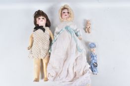 AN SFBJ BISQUE HEAD DOLL, nape of neck marked 'SFBJ 7 1=1' with other writing hidden by wig, fixed