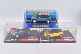 THREE BOXED SLOT CAR MINI COOPER MODELS, all 1/32 scale, Scalextric road car in blue, No.C2992,