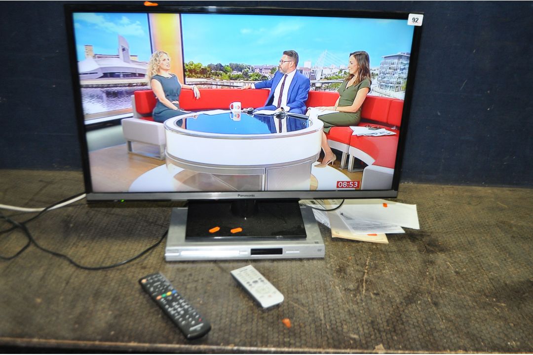 A PANASONIC TX-32AS600B with remote and a Philips DVD player with remote (both PAT pass and - Image 1 of 2