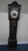 AN EARLY 20TH CENTURY OAK CASED CHIMING LONGCASE CLOCK, with a scrolled pediment, over an arched
