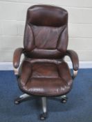 A MODERN BROWN LEATHER SWIVEL OFFICE CHAIR, width 69cm x depth 78cm x height 110cm, condition