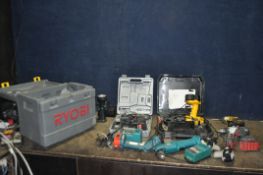 A COLLECTION OF CORDLESS POWER TOOLS including a DeWalt DW928 drill with case charger and two
