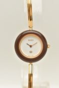 A 'GUCCI' WRISTWATCH, quartz movement, round dial signed 'Gucci' interchangeable bezels, gold plated