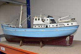 A KIT MODEL OF THE 'NORDKAP' 476 FISHING BOAT, a 1:50 scale wooden model painted pastel blue and