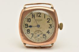A 9CT ROSE GOLD 'WALTHAM' WATCH HEAD, manual wind, round silver discoloured dial signed 'Waltham',