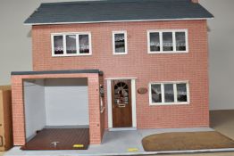 A BOX AND LOOSE DOLLS HOUSE AND ACCESSORIES, comprising a scratch built dolls house, comprising