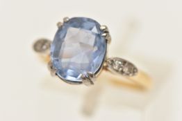 A SAPPHIRE AND DIAMOND RING, an oval cut cornflour blue sapphire, approximate total carat weight 3.