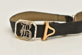 A VICTORIAN DIAMOND AND WHITE ENAMEL MEMORIAL BRACELET, adjustable black fabric bracelet fitted with