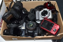 A BOX OF ASSORTED DIGITAL CAMERAS to include a Nikon D3100 fitted with a 18-55mm 1:3.5-5.6 lens, a