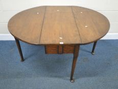 A GEORGIAN STYLE OAK GATE LEG TABLE, raised on cylindrical tapered legs, with pad feet, open width