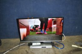 A SAMSUNG T32E310EX 32in TV without remote and a Philips DVD player with remote (both PAT pass and
