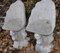 A PAIR OF MODERN CONCRETE GARDEN SEATS, shaped back, on a separate base that's decorated with