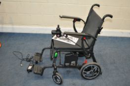 AN iCONNECT ZORA CARBON FIBRE ELECTRIC POWERCHAIR, the wheelchair has a 13kg lightweight frame for