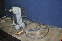 A TITAN TTL536PRW PRESSURE WASHER with lance and a Challenge Xtreme jet wash (incomplete lance, no