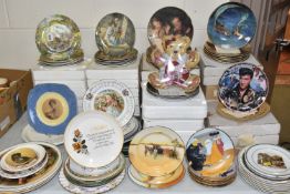 A LARGE COLLECTION OF COLLECTORS PLATES to include five Warner Brothers collectors plates