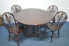 A 20TH CENTURY OAK GATE LEG TABLE, raised on block and turned legs, united by stretchers, diameter