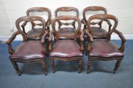 A SET OF SIX MAHOGANY REPRODUCTION BALLOON BACK CHAIRS, with scrolled open armrests, serpentine
