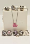 A PANDORA RING BOX WITH CHARMS AND A SWAROSKI PENDANT NECKLACE, to include eight 'Pandora' charms