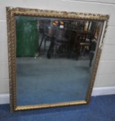 A GILT RESIN RECTANGULAR WALL MIRROR, 122cm x 106cm, condition report: in need of restoration, due