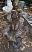A MODERN CONCRETE GARDEN WATER FEATURE in the form of a maiden knelt in a shell, width 66cm x