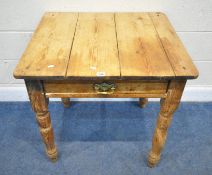 A 19TH CENTURY PINE TABLE, with a single drawer, raised on block and turned legs, width 77cm x depth
