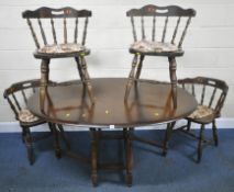 AN OAK OVAL GATE LEG TABLE, raised on turned supports, united by stretchers, open width 156cm x