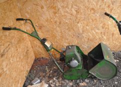 A VINTAGE QUALCAST COMMODORE PETROL CYLINDER MOWER with grassbox, condition report: Engine pulls