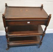 AN EARLY 20TH CENTURY OAK THREE TIER TROLLEY, with a single drawer, raised on turned supports, width