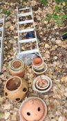 A COLLECTION OF GARDEN PLANT POTS AND AN ALUMINIUM STEP LADDER including strawberry pots, terracotta