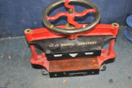 AN EARLY 20th CENTURY CAST IRON BOOK PRESS by the Adherent Tissue Co, Edmonton, London total width