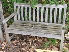A HARDWOOD GARDEN BENCH width 122cm. Condition Report: weathering to wood but sturdy