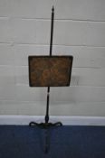A VICTORIAN MAHOGANY POLE SCREEN, with a height adjustable tapestry screen, raised on three shaped