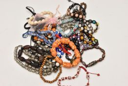 AN ASSORTMENT OF BEADED JEWELLERY, to include skull beads, Budda beads, ceramic beads, glass bead