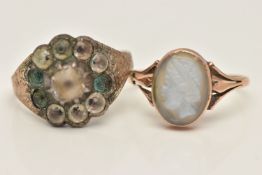 TWO GEM SET RINGS, the first a rose metal carved cameo ring, collet set to the trifurcated shoulders