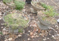 A PAIR OF LARGE CONCRETE GARDEN PLANTERS with fluted bowl and foliate detail to base, both 78cm in